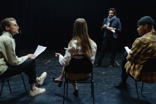 consultants in a meeting discussing performance metrics